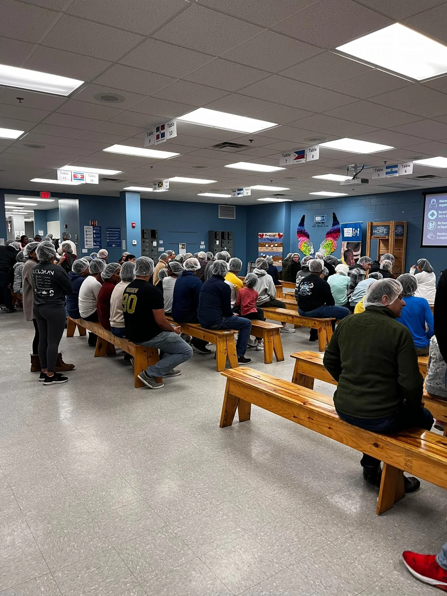Feed My Starving Children — packing hall filled with volunteers